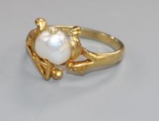 An early 20th century Art Nouveau 18ct gold and heart shaped baroque cultured? pearl set ring,