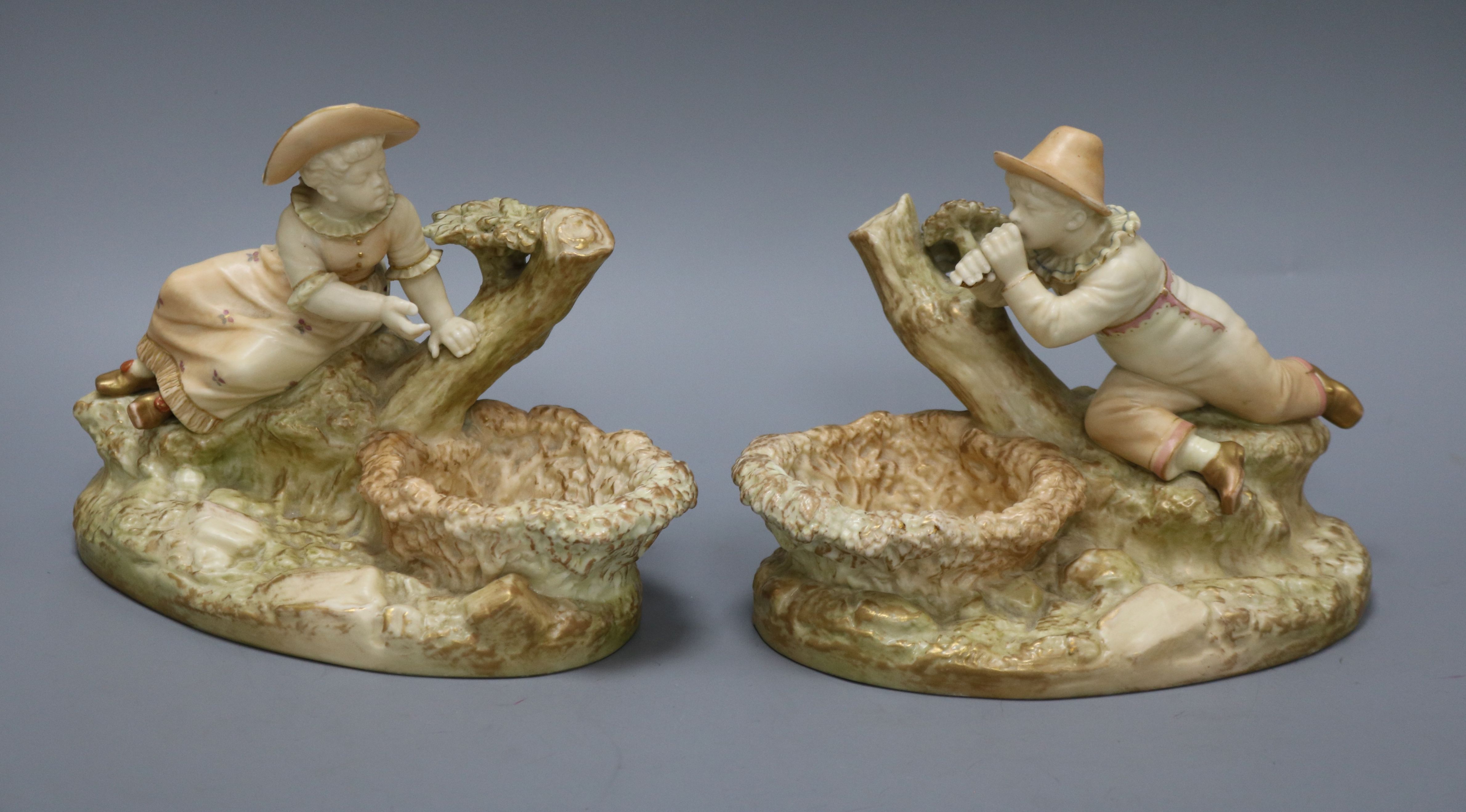 A pair of Royal Worcester James Hadley figural dishes