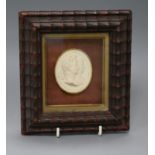 A Grand Tour plaster double portrait medallion, framed overall 16.5 x 15cm