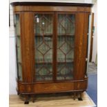 An Edwardian inlaid cabinet