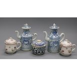 A pair of 19th century Chinese blue and white sauce jugs and covers, a pair of famille rose