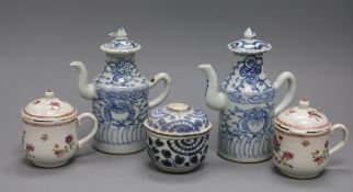 A pair of 19th century Chinese blue and white sauce jugs and covers, a pair of famille rose