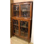 An Edwardian mahogany bow-fronted display cabinet W.110cm