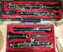 A Noblet cased oboe and another similar oboe