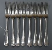 A set of eight silver Hanoverian pattern dessert forks, crested, London 1917, Josiah Williams & Co.,
