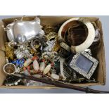 Mixed costume jewellery and silver items including a cream jug.