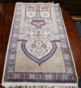 A Tunisian Persian style silk mat 100 x 52cm