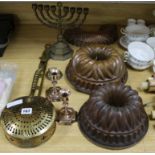 A quantity of brass and copper including a pair of candlesticks, two jelly moulds, etc