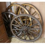 A set of four Victorian metal rimmed wagon wheels