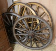 A set of four Victorian metal rimmed wagon wheels