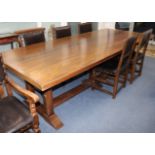 A large refectory table W.279cm