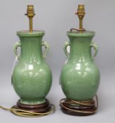 A pair of Chinese two-handled pyriform vase table lamps, crackle-glazed in green, the handles