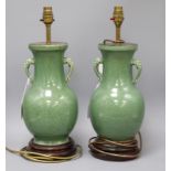 A pair of Chinese two-handled pyriform vase table lamps, crackle-glazed in green, the handles
