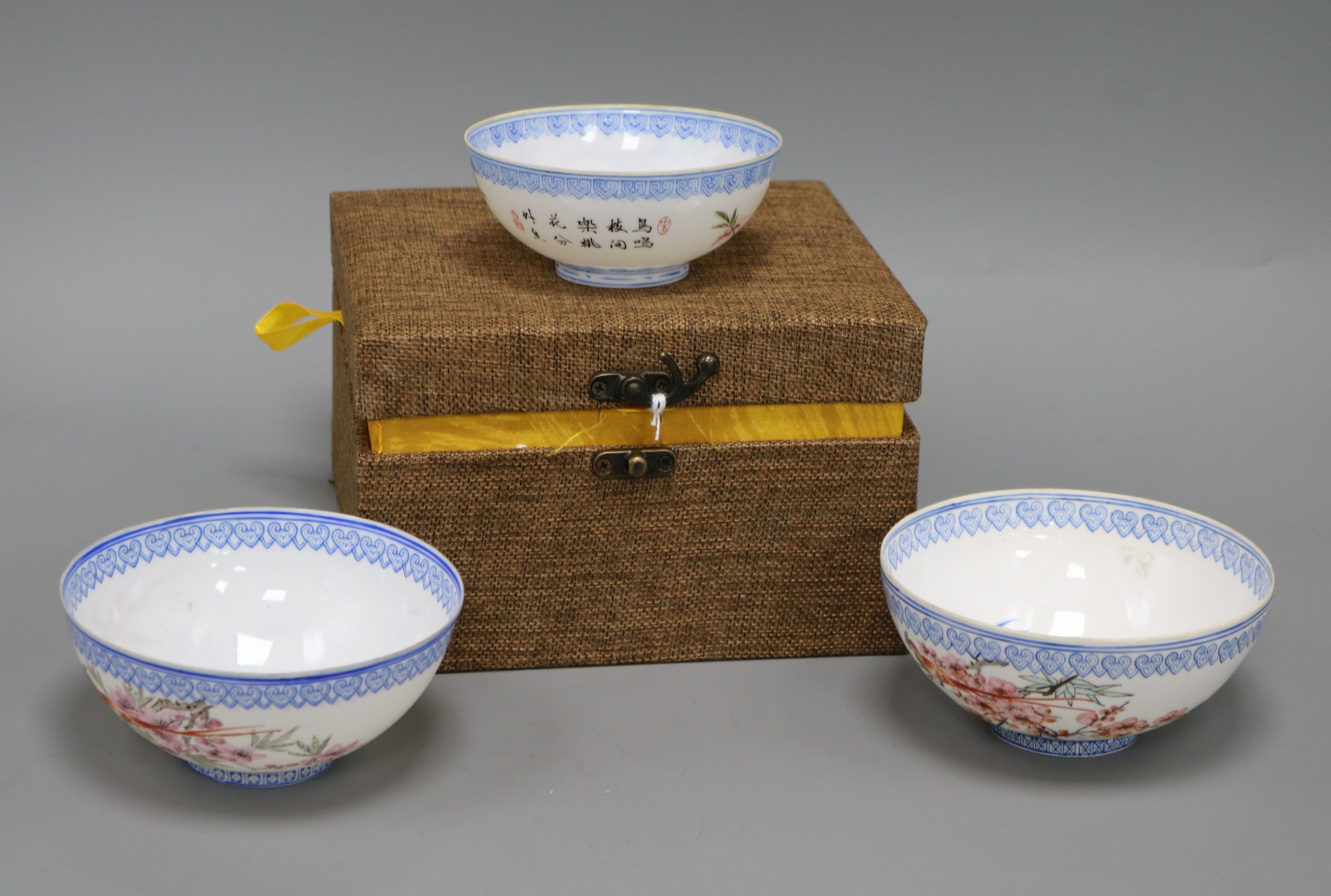 Three Chinese egg shell bowls, with fitted box