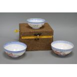 Three Chinese egg shell bowls, with fitted box