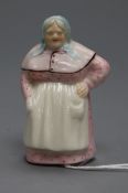 A Royal Worcester candle extinguisher of a lady