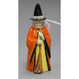 A Royal Worcester candle extinguisher in the form of a witch