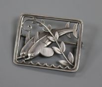 A Danish Georg Jensen sterling silver square brooch depiction twin dolphins, no. 251, 37mm.