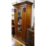 A late Victorian walnut single wardrobe W.107cm