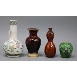 A Chinese famille rose vase and three monochrome vases