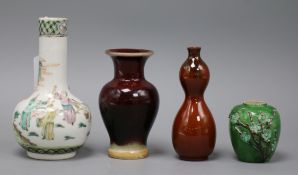 A Chinese famille rose vase and three monochrome vases