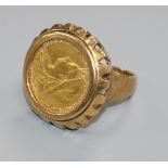A 9ct gold ring set with a 1901 half sovereign