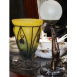 An Art Deco style figural lamp on marble base and an Art Nouveau style iron and glass lamp tallest