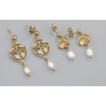 Two pairs of yellow metal and cultured pearl drop earrings, one pair stamped 9ct gold and modelled