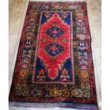 A Turkish rug 150 x 91cm