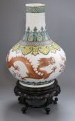 A 19th century Chinese famille rose dragon vase, wood stand height 32.5cm excl. stand