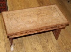 A Chinese carved low table W.63cm