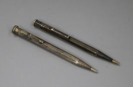 A 1930's silver cased pencil and one other white metal cased pen.