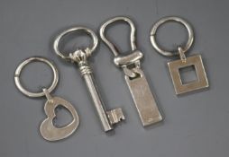 Four assorted Italian 'Old Florence' 925 white metal key rings.