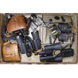 A collection of binoculars including two pairs of Zeiss Jena and a Negretti & Zambra folding Minim