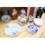 A quantity of Oriental ceramics and two pictures