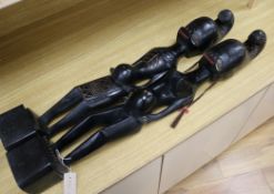 A pair of tall African ebonised figures height 61.5cm