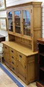 An Arts & Crafts style oak dresser W.171cm