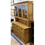 An Arts & Crafts style oak dresser W.171cm