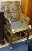 An Egyptian revival throne chair