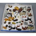 A collection of Britains farmyard animals, cows, sheep and haystacks, etc.