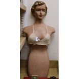 A 1940's/50's composition mannequin three quarter height