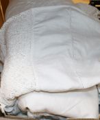 A quantity of white worked linen, a bed cover and three night dresses etc