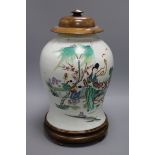 A Chinese famille rose jar, Republic period, wood stand and cover height 33.5cm excl. stand