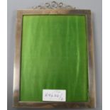 A late Victorian silver photograph frame, J. Batson & Son, London, 1899, 25.8 cm.