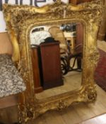 A Victorian style gilt framed wall mirror W.103cm
