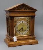 An Edwardian walnut mantel clock height 41cm
