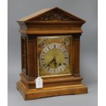 An Edwardian walnut mantel clock height 41cm