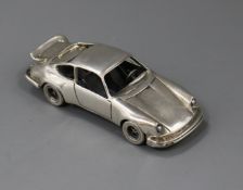 An Italian silver miniature model of a Porsche, 93mm.