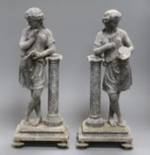 A pair of weathered spelter figures height 38cm