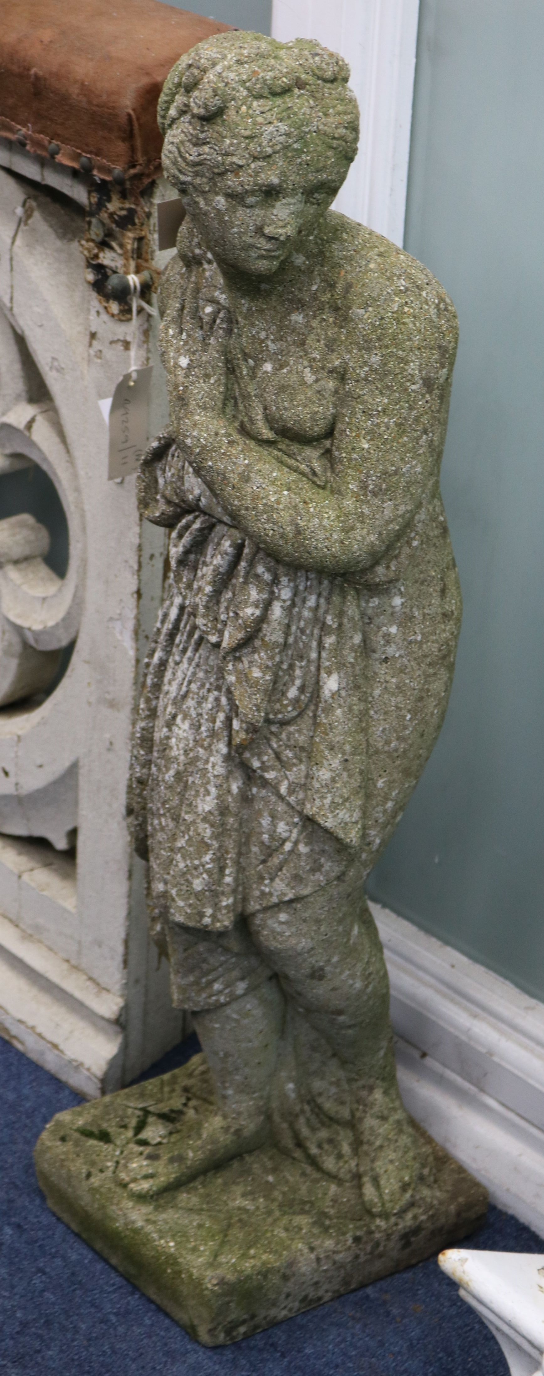 A reconstituted stone figure - Venus surprised W.21cm
